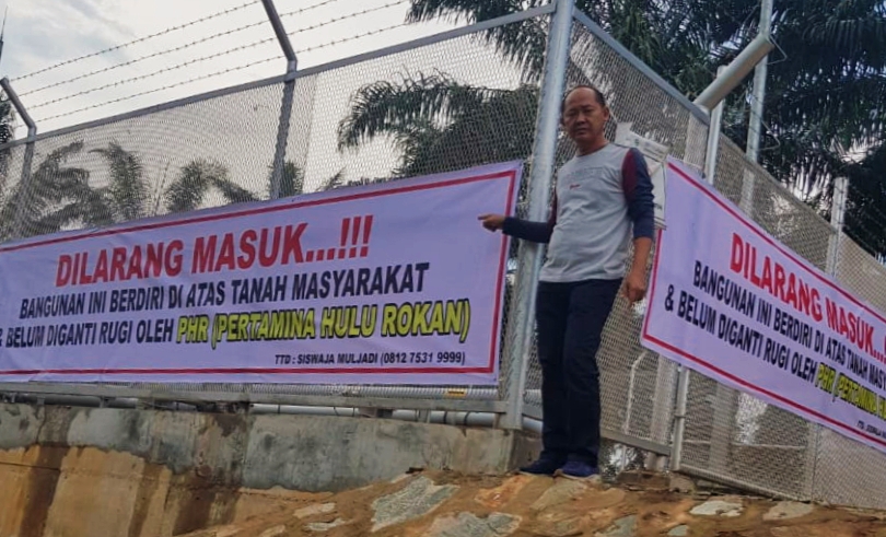 Protes Ganti Rugi Terhadap PT. PHR! Siswadja Muljadi Pasang Spanduk Dilokasi Bangunan Pipa 