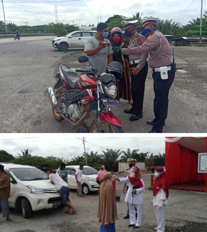 Sigap...Satlantas Polsek Tanah Putih Cek Suhu Pengemudi Dan Penumpang Angkutan Umum�