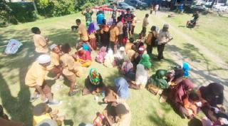 Meriahkan Hari Pahlawan, Terpantau Keakraban Warga Distrik Walesi Olahraga Bersama Satgas Yonif RK 751/VJS