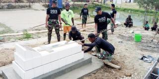 Satgas Yonif Mekanis 203/AK Ciptakan Lingkungan Bersih dan Indah