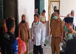 Bupati Pelalawan Berbagi dengan Warga Pangkalankerinci