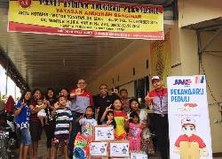 JNE Berbagi dengan Dhuafa di Pekanbaru